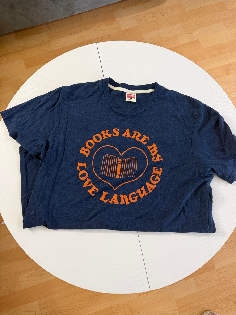 HOMAGE Navy Short Sleeve Tee with Orange Book Graphic